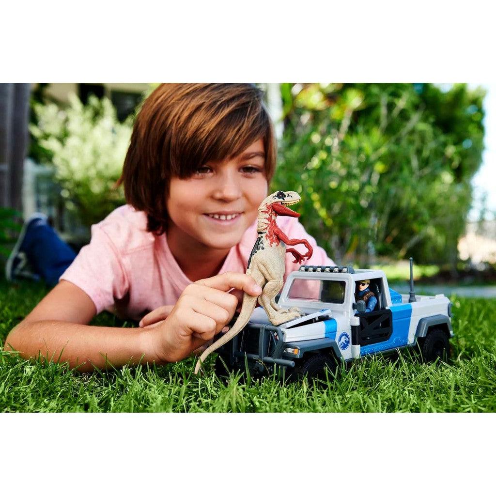 Mattel Jurassic World Search 'n Smash Truck Set with Atrociraptor Dinosaur & Human Action Figure