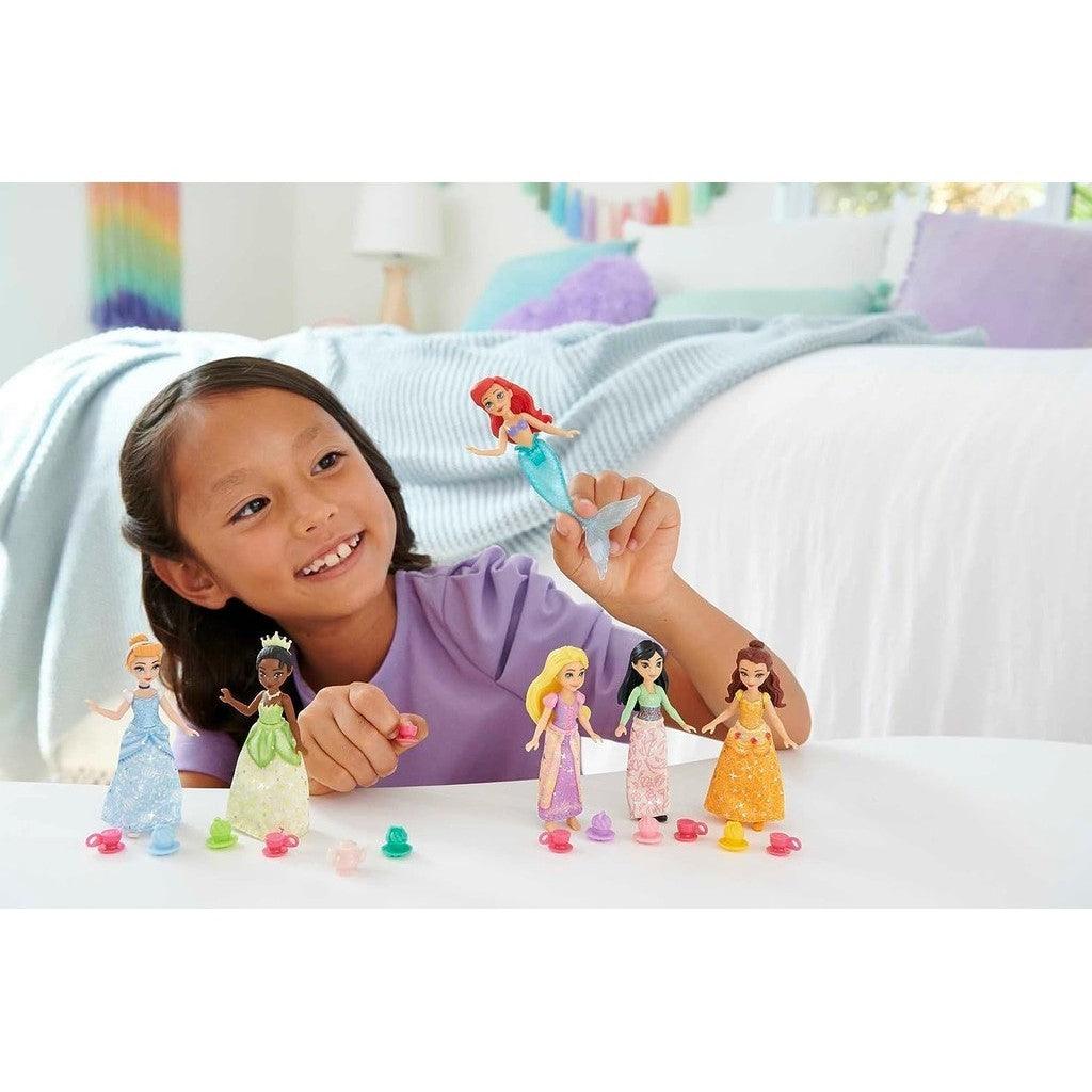 Mattel Disney Princess Toys, 6 Posable Small Dolls with Sparkling Clothing and 13 Tea Party Accessories Inspired