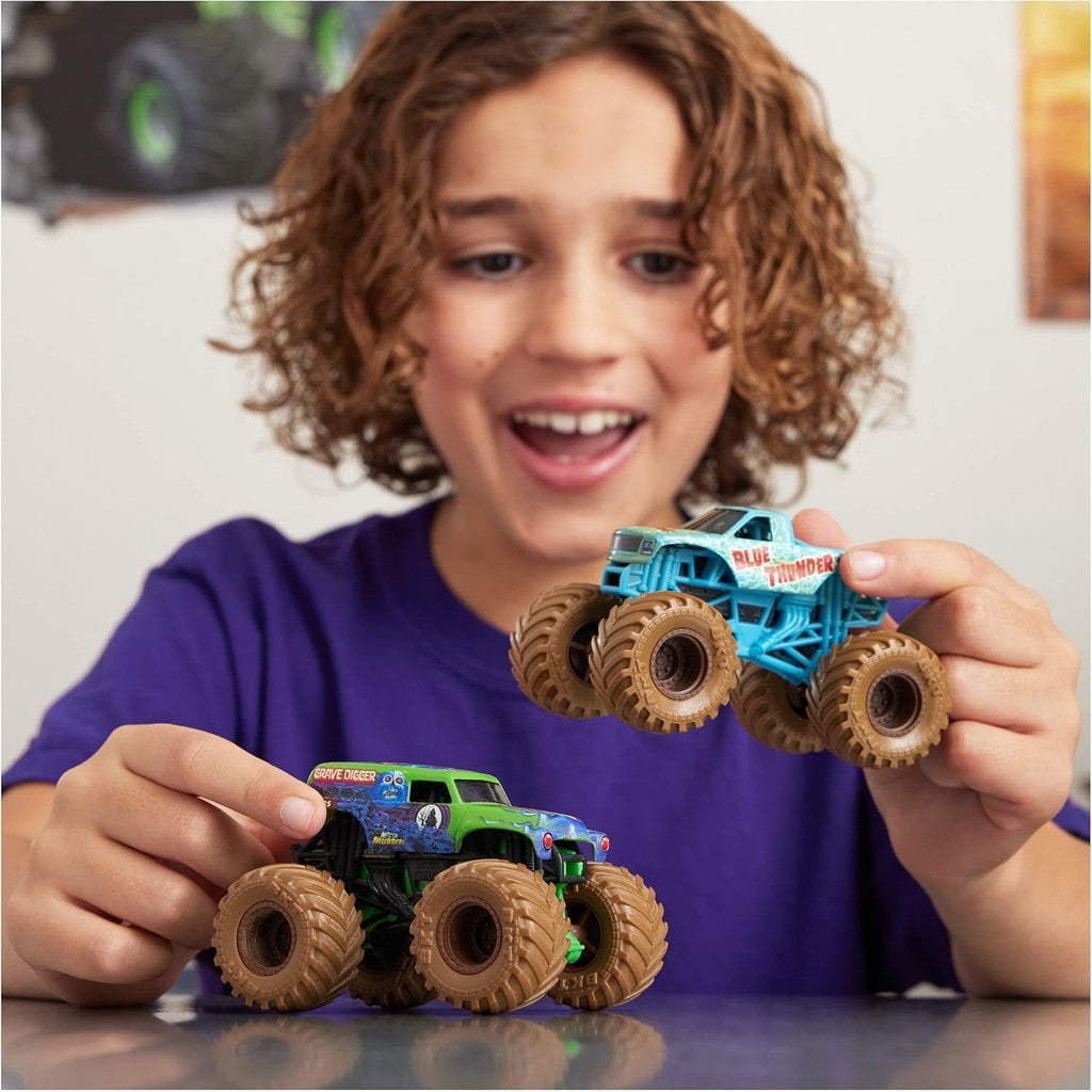 Monster Jam, Mystery Mudders 2-Pack, Official Grave Digger and Blue Thunder Die-Cast Monster Trucks Wash to Reveal